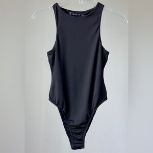 Lioness Black One Piece bodysuit, size S